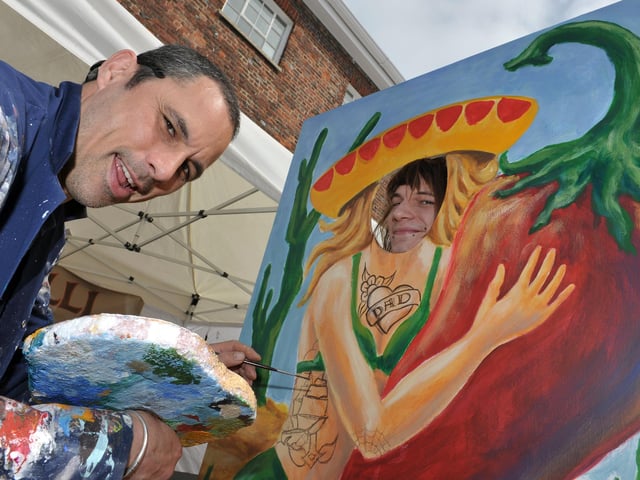 Michael Hassanyen, left, and Anturo Pereiza from Chilli Tattoo at Victorious Vintage 
(121916-645)