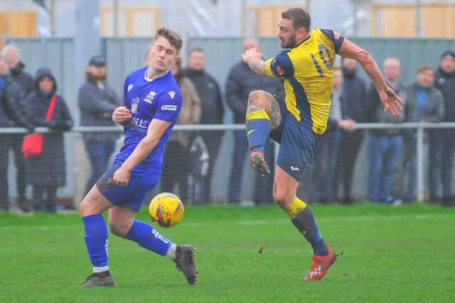 Moneyfields' Steve Hutchings, right, and Baffins defender Rhys Lloyd. Picture: Martyn White.