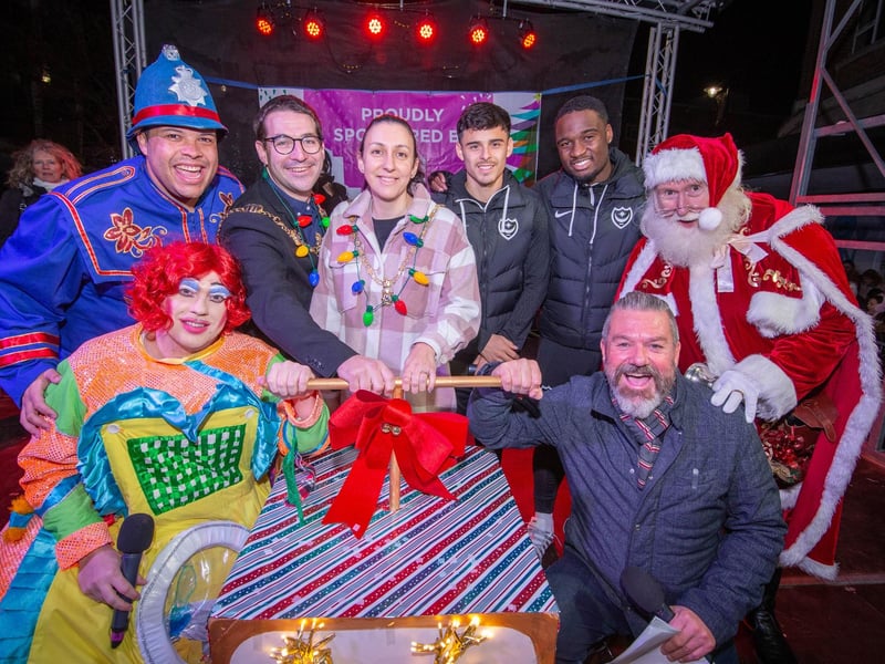Palmerston Road Christmas Lights Switch On at Southsea on Thursday 23rd November 2023

Pictured: Santa with the Lord Mayor, Tom Coles and Mayoress, Nikki Coles with Wave 105 presenter, Mark Collins with Pompey football players and cast of Alladin from New Theatre Royal.

Picture: Habibur Rahman