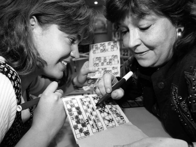 Kate Omrod aged 21 and Fran Steel aged 43, play bingo at the Top Rank club in Portsmouth, 1995. The News PP4465