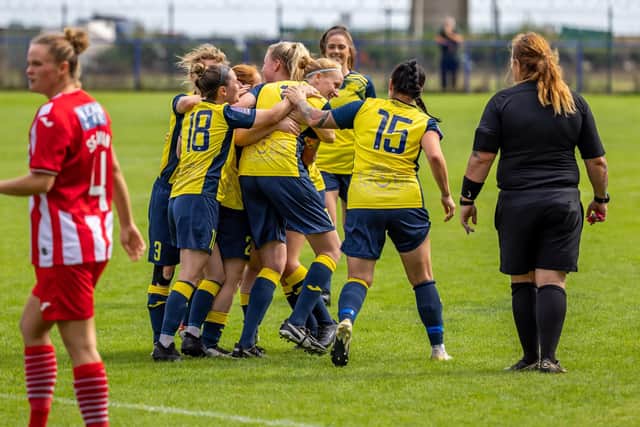 Moneyfields celebrate  taking the lead. Picture: Mike Cooter