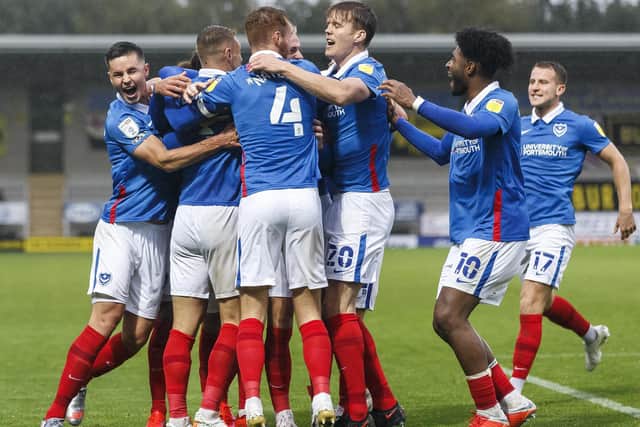 Pompey celebrate Jack Whatmough's goal against Burton. Picture: Daniel Chesterton/phcimages.com