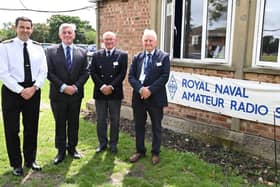 From left - Captain Davey, Commodore Sutermeister, Admiral Jones and Lieutenant Kirk at the RNARS shack. Picture by Keith Woodland