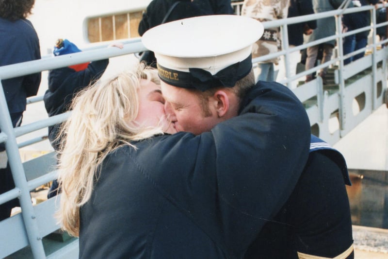 A sailor gives his partner a big kiss after the return of HMS Invincible in January 1996 PP696