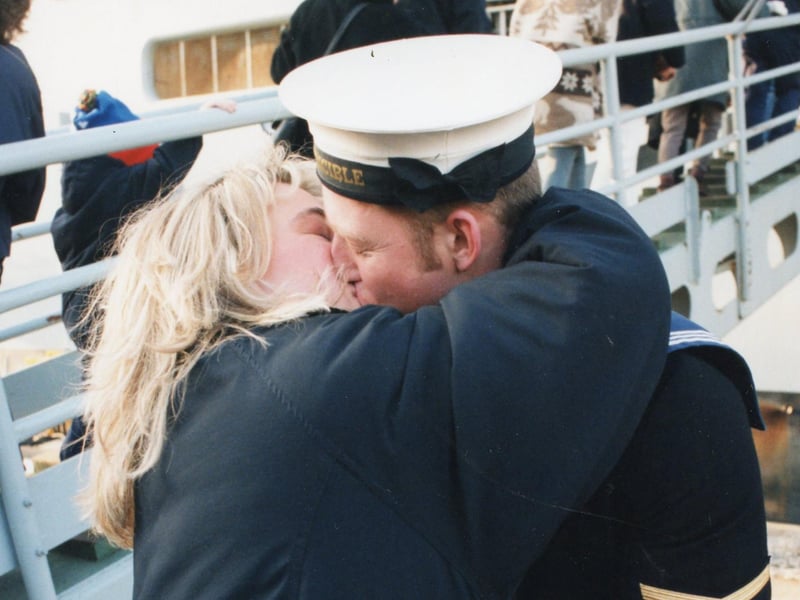 A sailor gives his partner a big kiss after the return of HMS Invincible in January 1996 PP696