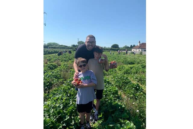 Josh Eaton with his chlidren George and Max