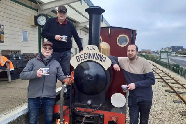 The directors of the new Hayling Light Railway Trust, Cliff Robinson, Chris Martin and Malcolm Harris, take a break from their volunteering duties to toast the new venture with a cup of railway tea.
