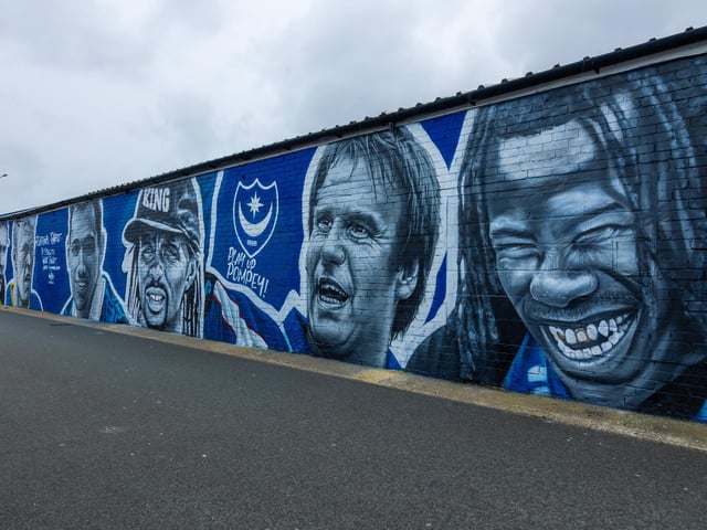 Six Portsmouth players were picked by the fans for the mural. The players were Alan Knight, Robert Prosinecki, Guy Whitingham, Nwankwo Kanu, Paul Merson and Linvoy Primus.