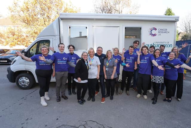 Adam Jackson, centre, with the iDx Lung Study team and their sampling van that visited communities across Portsmouth and Hampshire.