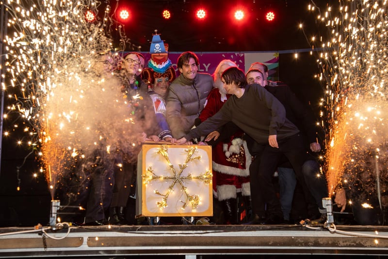 Hundreds of residents descended on Commercial Road to watch local dance troops and celebrities come together to turn on the Christmas lights.
Pictured - The Commercial Road Christmas lights are switched on
Photos by Alex Shute