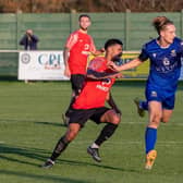 Baffins Milton Rovers striker Tom Vincent, right, scored twice after coming on against Cowes last night. Picture: Mike Cooter