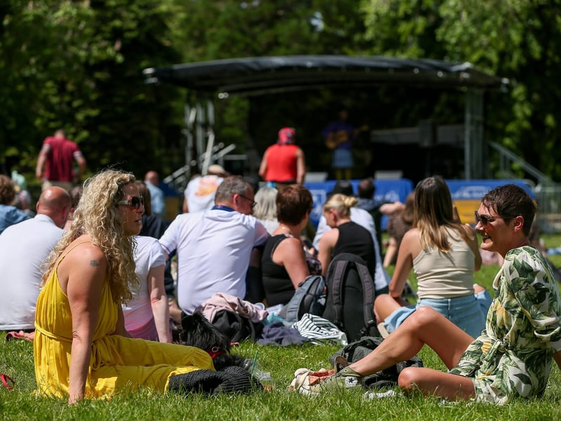 Cheryl Hutchesson, left, and Suzanne Conrath chat in the sun. Live at the Bandstand, Victoria Park, Portsmouth
Picture: Chris Moorhouse (010624-50)