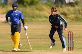 Hambledon's Justin Behrens, right, took three wickets in his side's SPL Division 1 victory over Portsmouth. Picture: Keith Woodland