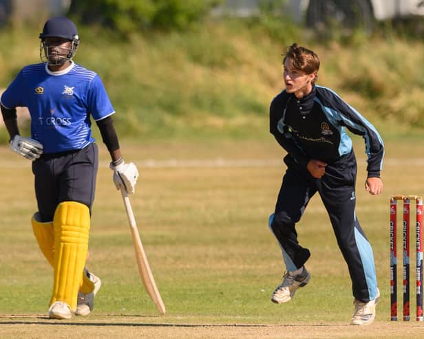 Hambledon's Justin Behrens, right, took three wickets in his side's SPL Division 1 victory over Portsmouth. Picture: Keith Woodland