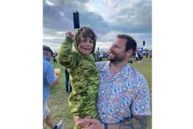 Rudy, four, with dad Rhys Bingham. Naval engineer Rhys is cycling from his childhood home in Leicester to his current home of Portsmouth to raise money for his son, who needs expensive ongoing healthcare.