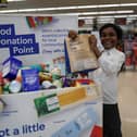 Pre-packed food donation bags are available at large stores in Portsmouth.