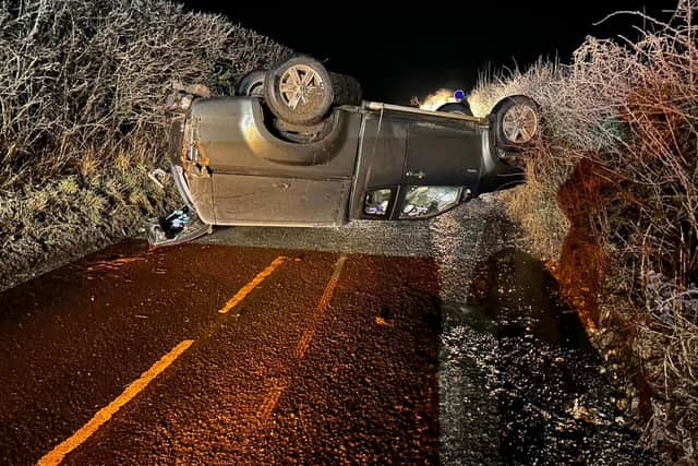 Police reported a driver has a 'lucky' escape after overturning his vehicle on black ice. Picture: Fareham police