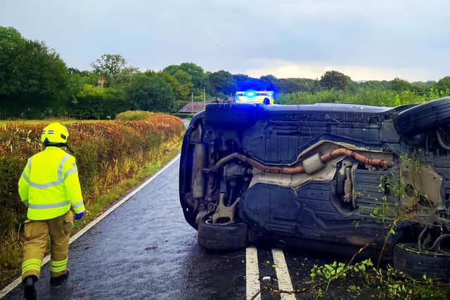 Picture taken with consent from the Twitter feed of PC Tom Van Der Wee showing the aftermath of a single-vehicle collision on the B2135 near Partridge Green. Picture: PC Tom Van Der Wee/PA Wire