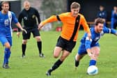 Joe Benn (orange) has netted 22 goals already for Littlehampton this season. Picture by Stephen Goodger