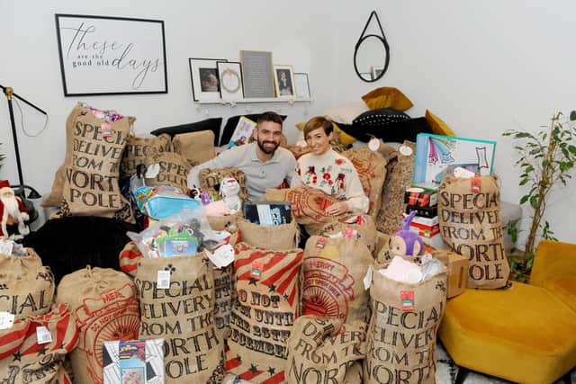 Sophie and Dan Baker from Waterlooville, started a group called PO Christmas present donation on Facebook in November, which really took off.
Picture: Sarah Standing (101220-46)