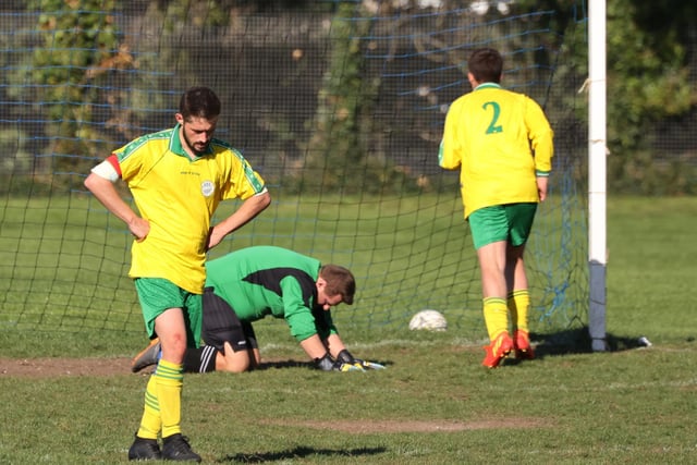 Wickham concede once again during their 8-3 defeat. Picture by Kevin Shipp