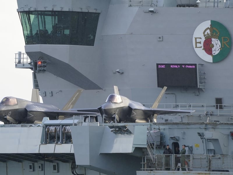 F35b jets line the deck of HMS Queen Elizabeth, as the Royal Navy aircraft carrier leaves Portsmouth Harbour. Picture date: Friday November 3, 2023. PA Photo. Andrew Matthews/PA Wire