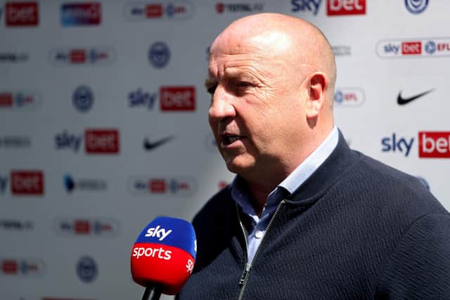 Accrington Stanley manager John Coleman is interviewed his side's 1-0 win over Pompey. Picture: Kieran Cleeves/PA Wire.
.