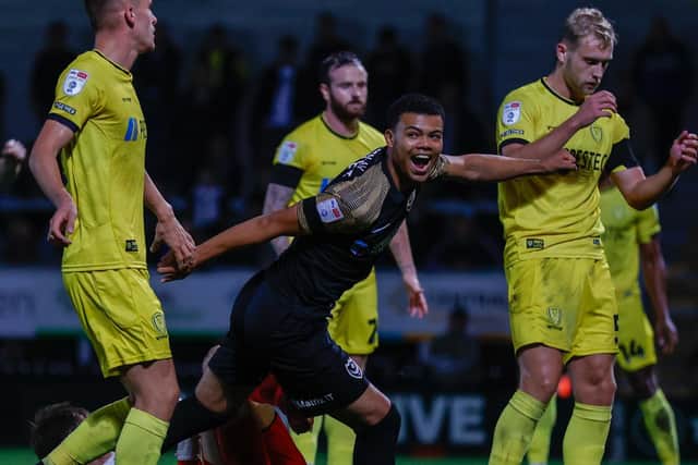 Dane Scarlett is one of three senior Pompey players currently away on international duty