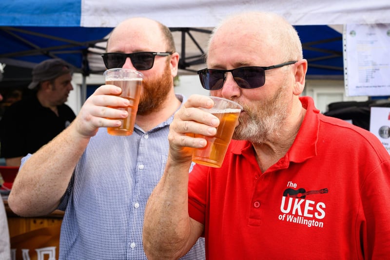 Pictured is: Gregg and Jim O'Brian enjoy a beer at the Taste of Wickham
Picture: Keith Woodland (100921-23)