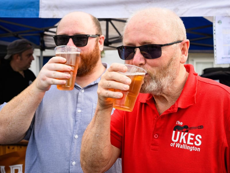 Pictured is: Gregg and Jim O'Brian enjoy a beer at the Taste of Wickham
Picture: Keith Woodland (100921-23)