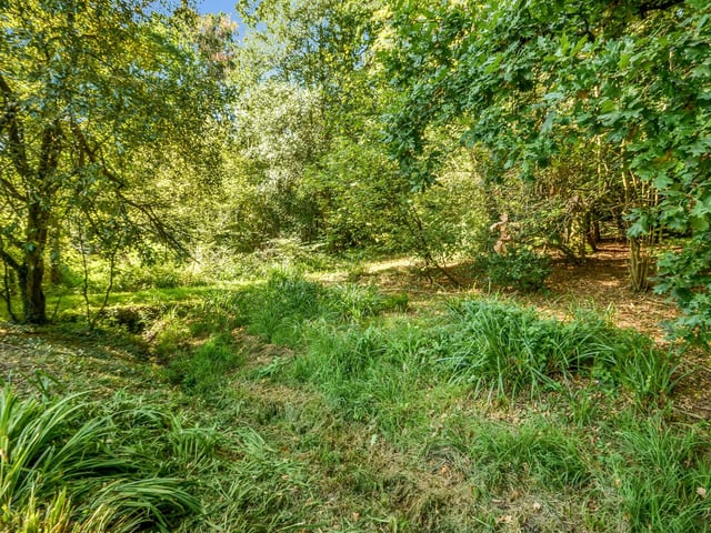This four bedroom detached family home is on the market at a guide price of £950,000. It is listed by Fine and Country.