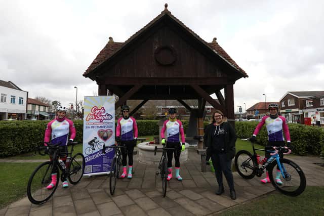 Sophie Fairall's mother, Charlotte Fairall, with riders, from left, Luke Bullous, Liam Blagg, Dan Cross and Andy Vaughan, as they prepare to leave Stubbington for a 24-hour bike ride 
Picture: Chris Moorhouse   (051220-04)