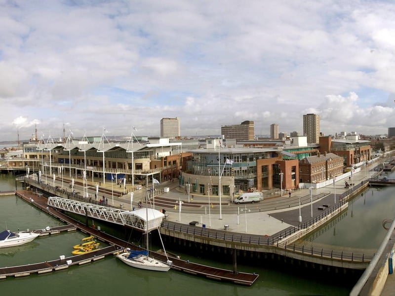 27th March 2001. A panoramic view of the commercial development of the former HMS Vernon site at Old Portsmouth, showing the yacht berths and Vernon Pool (right) and splendid visibility of Portsmouth Harbour (left). The picture was taken from the penthouse level at the very northern corner of Blake House in the residential area at Gunwharf Quays. Picture: Michael Scaddan