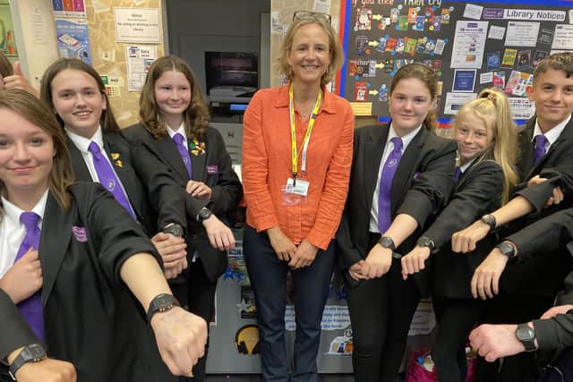 Millie Barrett, senior research assistant at EACH-B, with the Havant Academy pupils. 