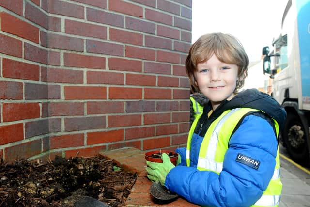 Year 2 pupils from Bramble Infant School and Nursery in Southsea, planted flowers outside the Co-op in Fawcett Road, Southsea, on Tuesday, March 23, as part of the Wilder Portsmouth scheme.

Pictured is: Wesley Purslove (7).

Picture: Sarah Standing (230321-5351)