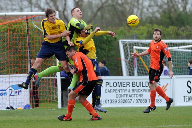 Jack Lee, far left, in action for Moneyfields against AFC Portchester in the 2013/14 season.

Picture: Allan Hutchings