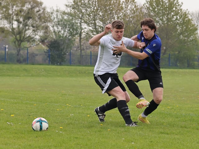 Action from the City of Portsmouth Sunday Football League Division Three match between Pompey Chimes (white shirts) and Horndean Hawks. Picture: Kevin Shipp