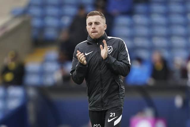 Pompey midfielder will serve a three-match ban following his dismissal against Oxford.
