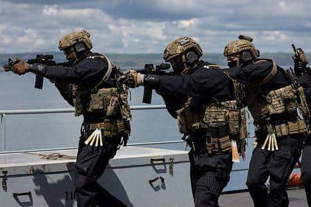 Pictured are ranks from 42 Commando Royal Marine’s Fleet Contingency Troop, conducting high vertical assault drills onto RFA Mounts Bay in Portland Harbour. As maritime warfare specialists, the SBS recruits principally from the Royal Marines.