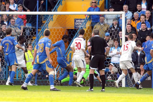 Kanu scores Pompey's winner against Bolton in April 2009