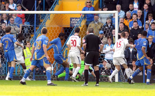 Kanu scores Pompey's winner against Bolton in April 2009