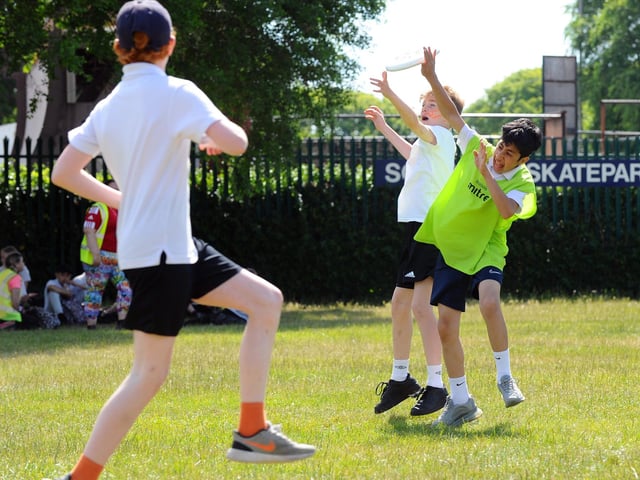 Year 7s have a go at Ultimate Frisbee. Picture: Sarah Standing (160622-6727)