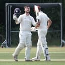 Ben Duggan celebrates  his century for Portsmouth at Calmore. Picture  by Martin Fisher.