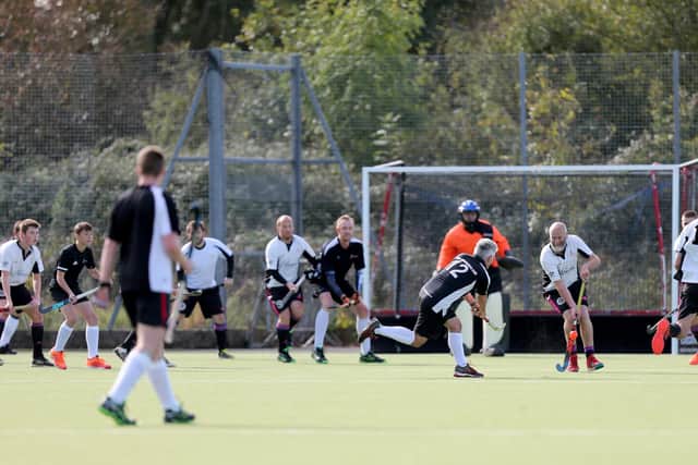 A Fareham 4ths player fires in a shot against Portsmouth 2nds. Picture: Chris Moorhouse