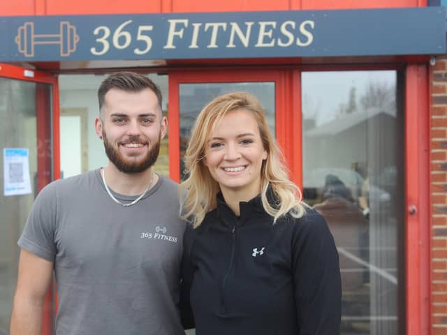 Devon Thorpe, 23, with fellow owner of 365 Fitness in Bishop's Waltham, James Corfield, 23. Devon said she was 'over the moon' after hearing the news that gyms can reopen after lockdown.
  
Picture: Sarah Standing