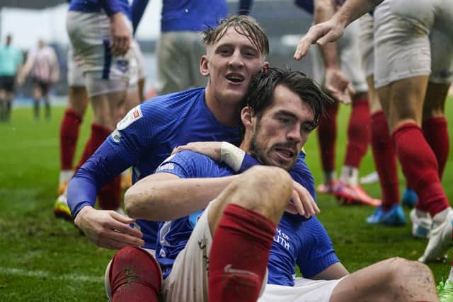 Ronan Curtis congratulates John Marquis for his second goal in Pompey's 4-0 hammering of Sunderland. Picture: Jason Brown