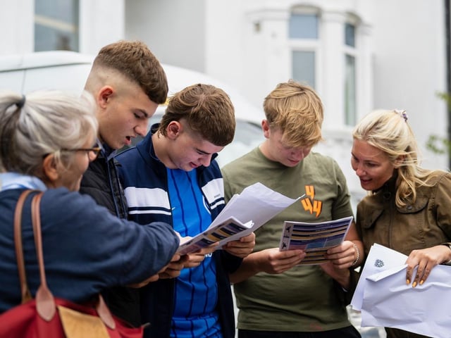 Delighted students and family members