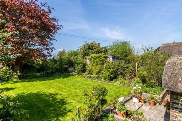 The listing says: "Thatchways is a delightful gem of a period property, full of lovely period features, including exposed timbering and huge fireplaces. Rooms are of a generous size and, in addition, an excellent annexe, with its own garden and separate entrance has been created which may be used independently or incorporated within the main accommodation, and has a more contemporary style."