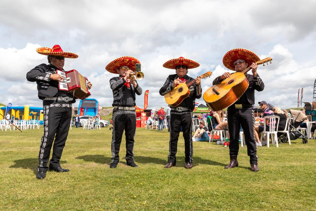 Members of 'Mariachi Tequila' who toured the site entertaining festival goers. Picture: Mike Cooter (210522)
