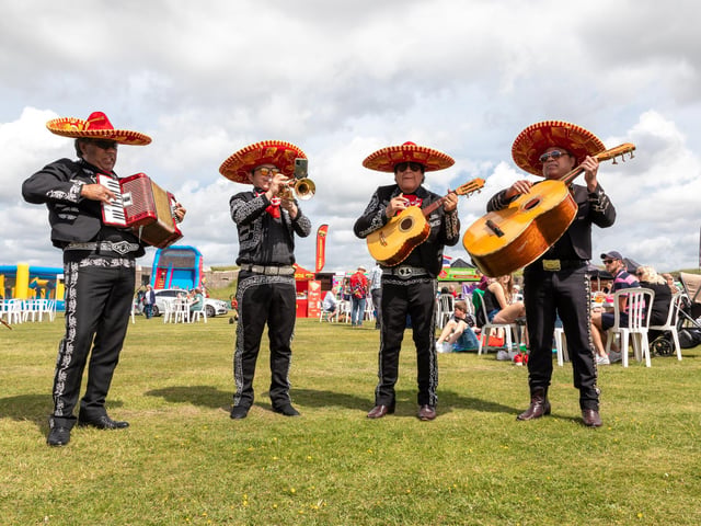 Members of 'Mariachi Tequila' who toured the site entertaining festival goers. Picture: Mike Cooter (210522)